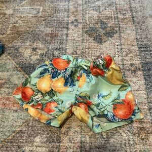 Posh peanut swim trunks